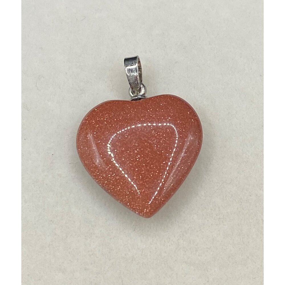 Gold stone heart pendant